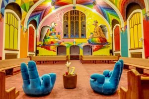 colourful decorations and funky chairs inside church of cannabis