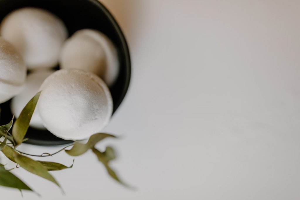 small bowl of white bath bombs